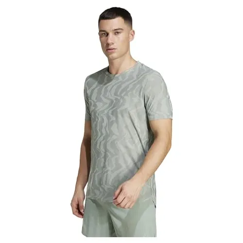 ADIDAS Herren T-Shirt Ultimate Running Engineered CLIMACOOL+ - Shirts & Tops mit CLIMACOOL+ Technologie für optimale Kühlung und Feuchtigkeitsmanagement, ideal für intensive Workouts bei jedem Wetter.
