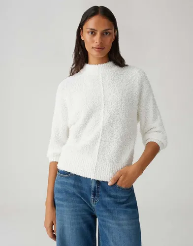 OPUS Strickpullover Punew - Flauschig & Modern - Der Strickpullover Punew bietet eine lockere Passform und ist aus hochwertigem Effektgarn gefertigt. Mit seinem weichen Griff und der markanten Mittelnaht ist er das perfekte Kleidungsstück für stilvolle und gemütliche Tage.