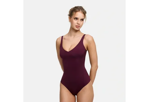 Damen Bodysuit mit starker Bauch- und Taillen-Kompression - Formt eine glatte Silhouette mit starker Kompression. Lifting Gesäßtaschen und verstellbare Träger sorgen für perfekten Sitz und Tragekomfort. Praktischer Druckknopfverschluss für leichtes An- und Ausziehen.