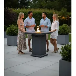 ELEMENTI Feuertisch MONTREAL - Wetterfester Bartisch aus Beton, 56x56x106cm - Feuerstellen – Der MONTREAL Bar Tisch bietet eine stilvolle Travertin-Optik, ideal für Outdoor-Events. UV-beständig und pflegeleicht, perfekt für jede Witterung!