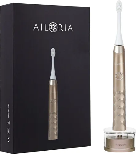 AILORIA Schallzahnbürste SHINE BRIGHT Limited Edition - Elektrische Zahnbürste mit dynamischer Reinigungswirkung, 3 Reinigungsprogramme und USB-Ladestation in elegantem Gold - für strahlend saubere Zähne.