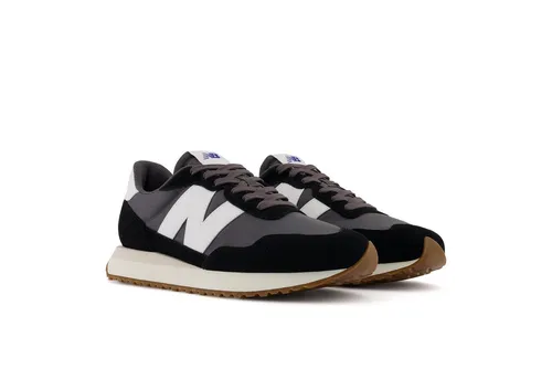 New Balance 237 Herren Leder-Sneakers in Braun, Größe 43 - Hochwertige Herrensneakers von New Balance mit robustem Leder-Obermaterial und rutschhemmender Laufsohle - ideal für stilvolle Freizeitlooks.