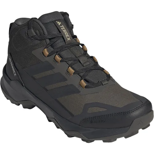 adidas Herren Terrex Skychaser AX5 Mid Gore-TEX Wanderschuhe - Robuste Wanderschuhe mit regulärer Passform, ideal für Outdoor-Abenteuer. Der LIGHTMOTION EVA-Zwischensohle sorgt für optimalen Komfort und die Gummiaußensohle bietet hervorragenden Grip.