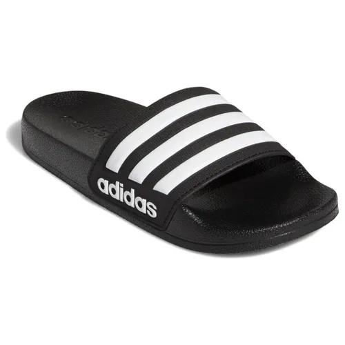ADIDAS Kinder Badepantoletten Shower adilette – Bequeme Badeschlappen - Die ADIDAS Kinder Badepantoletten bieten höchsten Komfort nach dem Schwimmen. Schnell trocknend und sanft gepolstert, ideal für unbeschwerte Sommertage am Wasser.