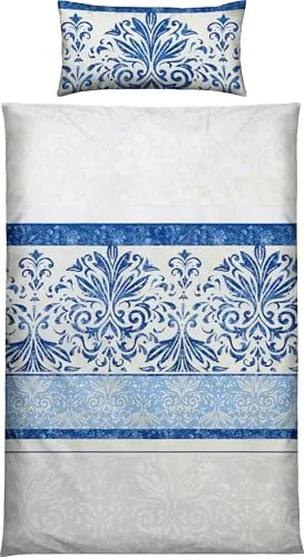 Erwin Müller Bettwäsche Mako-Satin Ornamente blau 40x80 cm / 135x200 cm - Erleben Sie den Komfort der Erwin Müller Mako-Satin Bettwäsche mit kunstvollen Ornamenten. Der praktische Reißverschluss und das atmungsaktive Material sorgen für ein angenehmes Schlafklima.