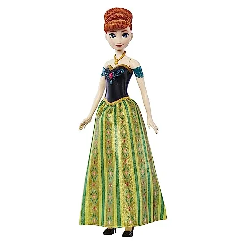 Mattel Disney Die Eiskönigin Singende Anna-Puppe - 30-sekündiger Song-Ausschnitt, klassisches Schlossoutfit, abnehmbarer weicher Rock, kämmbare Haare, für Kinder ab 3 Jahren, Spanisch Version, HMG43