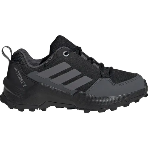 adidas Terrex Ax4R RAIN.RDY Wanderschuhe für Kinder - Wanderschuhe mit wasserdichtem Obermaterial und exzellentem Grip, ideal für kleine Entdecker. Umweltfreundlich, aus 20 % recycelten Materialien, bieten sie optimalen Komfort und Halt bei jedem Wetter.