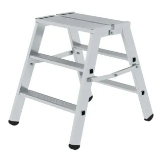 MUNK Klapptritt 50095 - Aluminium Arbeitspodest mit 2 x 3 Stufen - Leiter, bis 150 kg belastbar, bietet eine maximale Arbeitshöhe von 2,69 m. Beidseitig begehbar für flexiblen Einsatz, mit rutschhemmenden Fußkappen für optimale Sicherheit.