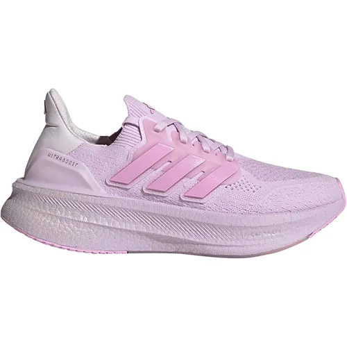Adidas Ultraboost 5 Damen - lila - Der adidas Ultraboost 5 für Damen in lila bietet unvergleichlichen Komfort und Energie-Rückgabe mit der leichtesten BOOST Dämpfung. Ideal für Training und Alltag, mit stabilisierendem Torsion System für ein optimales Laufgefühl.
