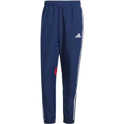 adidas Performance Trainingshose TIRO 25 ESSENTIALS WOVEN HOSE schwarz W36 - Bequeme Trainingshose für Fußball, aus recyceltem Polyester, ideal für sportliche Aktivitäten. Hoher Tragekomfort und optimale Bewegungsfreiheit.