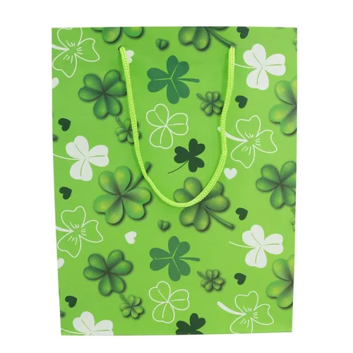 Idena Geschenktüte Glücksklee grün 18,0 x 23,0 cm – Ideal für besondere Anlässe - Die Idena Geschenktüte Glücksklee in grün (18,0 x 23,0 cm) ist perfekt für Geschenke und besondere Anlässe. Sie bringt Freude und Stil in Ihre Präsentation und eignet sich für jeden Anlass.