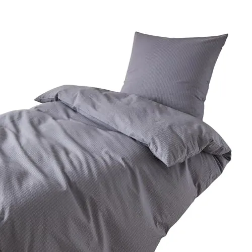 Traumschlaf Seersucker Bettwäsche Uni anthrazit, 1 Bettbezug 140 x 200 cm + 1 Kissenbezug 70 x 90 cm - Bettwäsche-Sets aus luftiger Seersucker-Baumwolle, ideal für heiße Sommernächte, pflegeleicht und bügelfrei, für besten Schlafkomfort.