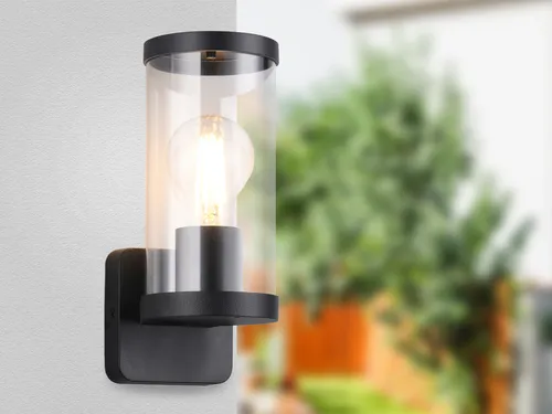 LED Außen-Wandleuchte Schwarz - Stilvolle Fassadenbeleuchtung für Haus und Terrasse - Die elegante 23 cm hohe Außenwandleuchte aus robustem Druckgussaluminium bietet vielseitige Einsatzmöglichkeiten. Mit IP44 Schutzklasse ideal für Außenbereiche und inklusive E27 LED Leuchtmittel für warmweißes Licht.