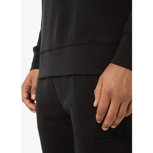 Super.Natural M Solution Crew jet black (872) M – Hochwertiger Merinopullover - Der M Solution Crew von Super.Natural vereint Stil und Funktionalität. Ideal für Herren, bietet dieser Pullover aus Merinowolle hohen Tragekomfort und eignet sich perfekt für Freizeit und Sport.