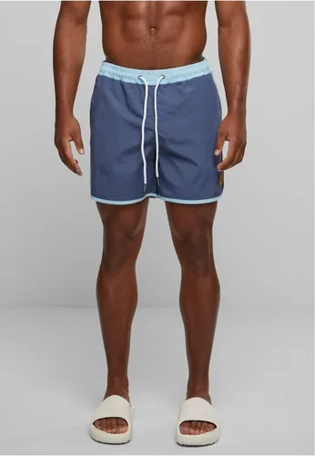 Urban Classics Herren Retro Swimshorts – Schnelltrocknende Badeshorts für Strand & Pool, Vintageblue/Oceanblue, 5XL - Klassische Retro Swimshorts aus leichtem Polyester mit elastischem Bund und Kordelzug. Ideal für Strand, Pool und Freizeit. Praktische Seitentaschen bieten Platz für Essentials – perfekt für heiße Sommertage.