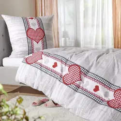 TRAUMSCHLAF Bettwäsche Herzen, Flanell, 2-teilig - Kuschelige Flanell-Bettwäsche für warme Nächte, atmungsaktiv und feuchtigkeitsregulierend, ideal für kühle Jahreszeiten.