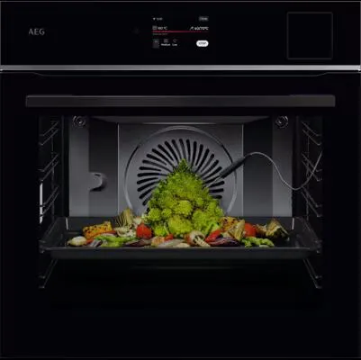 AEG TP8SB73ZAB Einbaubackofen, 70 L mit SteamPro und WLAN - Backofen der Energieeffizienzklasse A++ mit 26 Beheizungsarten und innovativer Sous-Vide-Funktion für gesundes Kochen zu Hause.