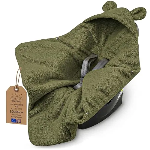 Einschlagdecke Babyschale Boucle – Komfortable Babydecke für Neugeborene in Olivgrün - Die Einschlagdecke aus weichem Boucle-Stoff sorgt für wohlige Wärme und Geborgenheit. Ideal für Kinderwagen und Babyschale, handgefertigt in der EU und perfekt für unterwegs. Universell einsetzbar und pflegeleicht.