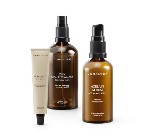 JUNGLÜCK Hautpflege-Set Bye Bye Pickel Trio - Entdecke das Bye Bye Pickel Trio für eine klare Haut: Mit klärendem Zink Gesichtswasser, einem wirksamen Serum und punktueller Paste zur gezielten Anwendung. Ideal für eine ausgeglichene Hautpflege.