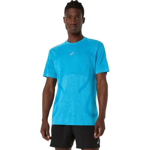 ASICS Herren T-Shirt ROAD SEAMLESS SS TOP – Komfortabel und atmungsaktiv - Nahtloses T-Shirt für Läufer, mit strategischen Belüftungszonen für optimalen Komfort und Atmungsaktivität. Hergestellt aus 50 % recyceltem Polyester, ideal für umweltbewusste Sportler.