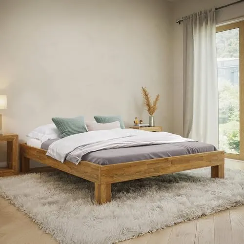 skølm Massivholzbett Floki aus Eiche – Modernes Design für Ihr Schlafzimmer - Massivholzbett aus geölter Eiche in 120/140/160/180 x 200 cm, vereint skandinavisches Design mit individueller Holzstruktur für eine warme Atmosphäre.