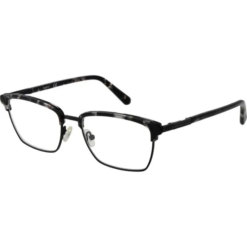 Guess Brillenfassung GU50062 020 54 – Herren - Moderne Browline-Brillenfassung aus schwarzem Metall mit komfortablem Federscharnier. Ideal für stilbewusste Herren, die Wert auf Qualität und Design legen. Inklusive Original-Etui.