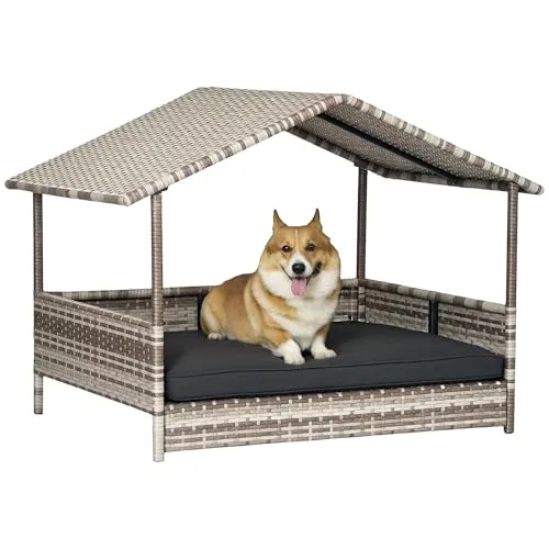 PawHut Rattan Hundeliege Outdoor mit Dach - Hundebett für kleine und mittelgroße Hunde, wetterbeständig mit stabilem Metallrahmen und komfortablem, wasserfestem Kissen für optimalen Schlaf im Freien.