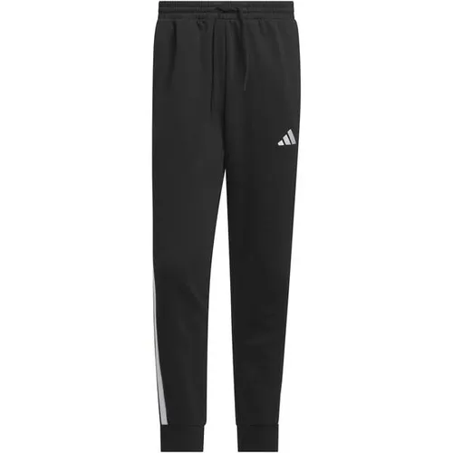 ADIDAS Herren Hose Essentials 3-Streifen - Modische Hosen aus weichem Baumwollmix mit angerauter Innenseite, ideal für sportlichen Style im Alltag und umweltfreundlich durch recycelte Materialien.