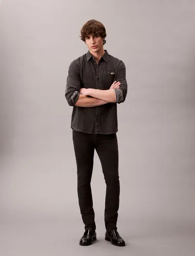 Calvin Klein Jeans SKINNY JEAN REGEN mit Gürtelschlaufen - Moderne Skinny-Fit Jeans in CK ESSENTIAL BLACK, elastisches Denim für optimalen Tragekomfort, ideal für lässige Styles.