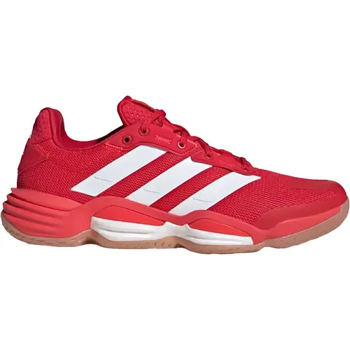 Adidas Stabil 16 - rot, Hallenschuh für maximale Performance - Indoorschuhe mit innovativer adidas BOOST Zwischensohle für optimale Energierückgabe und Stabilität. Hergestellt aus mindestens 20 % recycelten Materialien für einen nachhaltigen Einsatz.