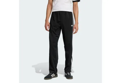 adidas Originals Sweatpants mit elastischem Bund in Schwarz, Größe XS - Die adidas Originals Sweatpants überzeugt durch ihren lockeren Schnitt und bietet optimale Bewegungsfreiheit. Der elastische Bund sorgt für hohen Tragekomfort, während Reißverschlusstaschen praktische Lösungen für Kleinigkeiten bieten.
