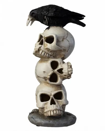 Horror-Shop Dekofigur Schwarzer Rabe auf Totenschädelberg mit LED - Mystische Dekofigur: Schwarzer Rabe auf Totenschädelberg mit LED-Beleuchtung (29 cm) für gruselige Atmosphäre. Ideal für Halloween und festliche Anlässe. Farbwechselnde Lichtakzente setzen besondere Akzente auf jedem Tisch.