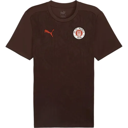 PUMA FC St. Pauli Trainingstrikot 3XL - Sportfan T-Shirt aus 100 % recyceltem Material mit dryCELL Technologie für schweißfreies Training und optimalen Tragekomfort.
