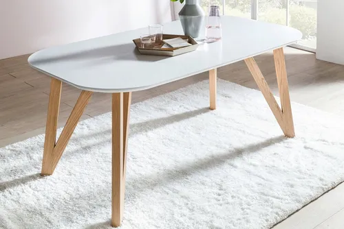 SalesFever Esstisch im skandinavischen Design - Esstisch in skandinavischem Design, mit einem stabilen Gestell aus massiver Eiche und pflegeleichter MDF-Tischplatte in Weiß, ideal für moderne Essbereiche.