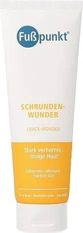 Fußpunkt Schrundenwunder Creme - Arzneimittel zur Pflege trockener Haut, macht die Haut weich und geschmeidig und schützt vor Hornhaut und Schrunden. Ideal zur Linderung von Juckreiz und Rötungen.