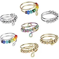 VIKY Antistress Ring 7er Set für Damen und Mädchen - 7-teiliges Antistress Ring Set mit bunten Spinnern und verstellbaren Ringen. Ideal zum Stressabbau und für eine entspannende Auszeit. Hochwertiger, hypoallergener Edelstahl sorgt für Komfort und Langlebigkeit.