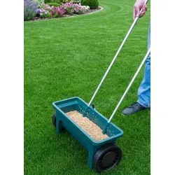 Streuwagen DELUXE - Vielseitiger Dünger- und Saatgutstreuer - Praktischer Handstreuwagen für Garten und Wintereinsatz. 10 einstellbare Stufen für präzisen Auswurf. Robuster Alu-Handgriff und profilierte Kunststoffreifen für einfaches Handling auf jedem Terrain.