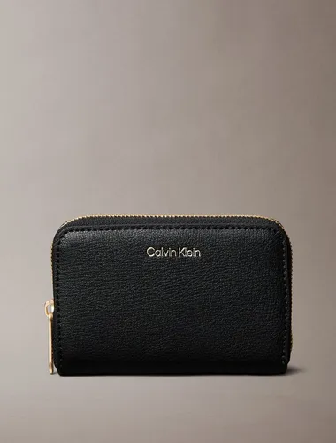 Calvin Klein Damen Geldbörse Foil Logo Zip Around - Damen-Geldbörse im eleganten Schwarz mit Foil Logo, bietet ausreichend Platz und ist perfekt für stilbewusste Frauen.