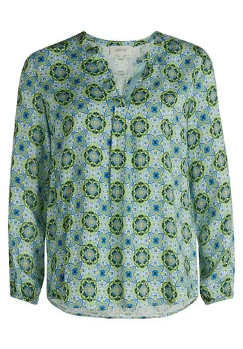 Cartoon Damen Blusenshirt mit Muster 40 in Green/Blue - Stylisches Cartoon Damen Blusenshirt mit modernem V-Ausschnitt und aufgesteppten Bändern. Ideal für einen lässigen Look, vielseitig kombinierbar mit Blazern oder Jeans. Gesamtlänge ca. 70 cm – perfekt für jeden Anlass.