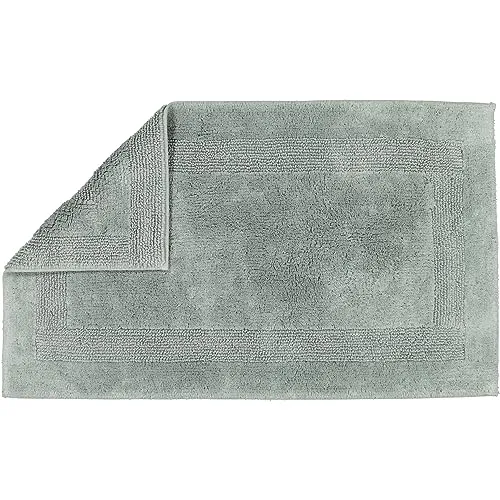 Wende-Badematte Cawö grün - Badteppich von CAWÖ: Hochwertige 100% Baumwolle, wendbar mit zwei unterschiedlichen Florhöhen, ideal für Trockner und Fußbodenheizung. Maschinenwaschbar für einfache Pflege.