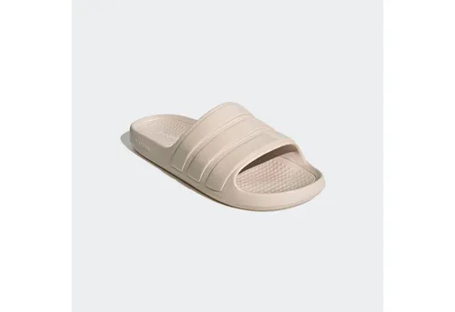 adidas Unisex Adilette Flow Slides - Dusch- & Badeschuhe für Herren mit regulärer Passform und einteiliger, vorgeformter Konstruktion für optimalen Komfort.
