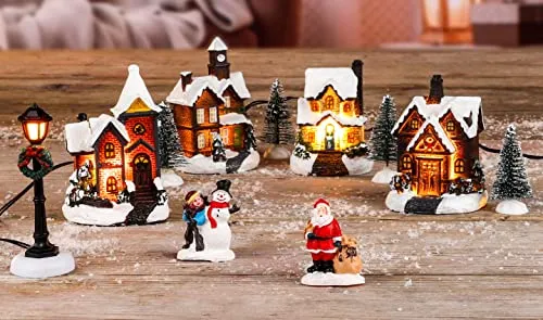 Spetebo LED Weihnachtsstadt - 11-teiliges Set mit 5 warmweißen LEDs - Weihnachtlicher Zierschmuck, 11-teiliges Set aus Häusern und Figuren, perfekt beleuchtet mit 5 warmweißen LEDs für festliche Stimmung.