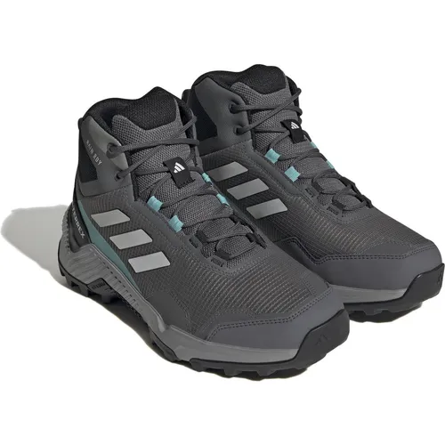 adidas Damen Eastrail 2.0 Mid RAIN.RDY Wanderschuhe - Wasserdichte Wanderschuhe mit atmungsaktivem Obermaterial aus 50% Recycling-Material, ideal für jedes Wetter und unwegsames Gelände.