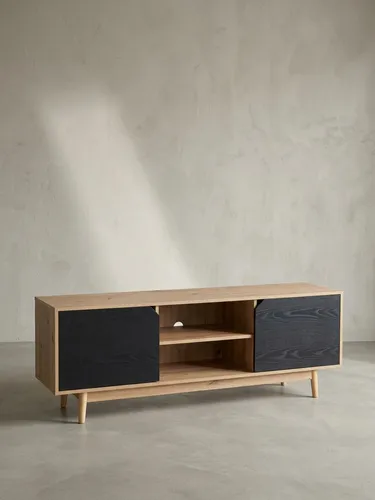 Modernes Lowboard Eiche-Nachbildung Schwarz 150x55x40 cm - TV-Halterungen mit modernem Design, geeignet für TVs bis 70 Zoll, inklusive Kabeldurchlass für eine ordentliche Verkabelung und Anti-Rutsch-Noppen zum Schutz des Fußbodens.