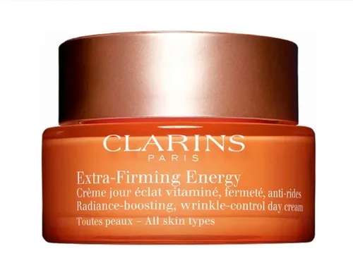 Clarins Extra Firming Energy Glow Plus Complex 50ml - Ganzkörperpflege mit 2-in-1-Effekt für strahlendes Aussehen und Festigkeit. Ideal für aktive Frauen ab 40, die einen gesunden Glow und energetisierende Eigenschaften suchen.