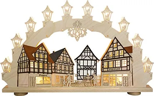 WEIGLA Schwibbogen Altstadt – Original Erzgebirge Weihnachtsdeko - Weihnachtlicher Zierschmuck – Hochwertiger Holzschwibbogen mit 15 Lampen und Ersatzlampe, ideal für eine festliche Fensterbeleuchtung und weihnachtliche Atmosphäre.