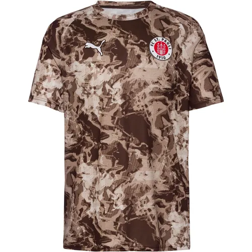 Puma FC St. Pauli Trikot Home für Herren 2025/2026 - Größe XL, Braun - Trikots für Herren – Mit der innovativen dryCELL-Technologie bleibst du beim Training trocken und kühl. Aus 100 % recyceltem Material für nachhaltigen Sportgenuss. Offizielles FC St. Pauli Logo zeigt deine Vereinsliebe.