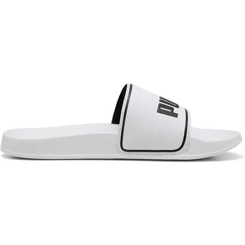 PUMA Herren Sandalen Leadcat 2.0 - Komfort und Stil - Badeschuhe mit gepolstertem Lederriemen und geformtem Fußbett für höchsten Komfort. Ideal für entspannte Sommertage am Pool oder zu Hause.