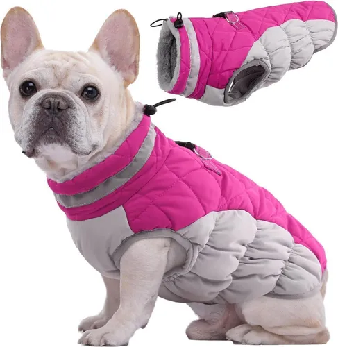 Kuoser Wasserdichter Hundemantel für den Winter - Halten Sie Ihren Hund warm und trocken mit dem Kuoser Hundemantel. Wasserdicht, gefüttert und mit reflektierenden Riemen für mehr Sicherheit. Einfaches An- und Ausziehen dank elastischer Bauchbänder und Reißverschluss.