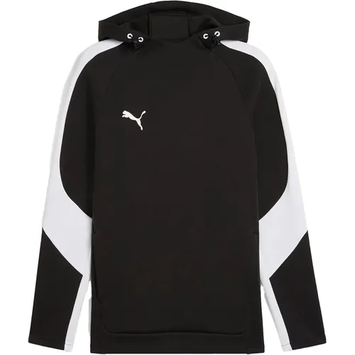 Puma teamEVOSTRIPE Hoody - schwarz - Hoodies für Teamreisende, cool und komfortabel, vereint Sportstyle mit Funktionalität für optimale Synergien.
